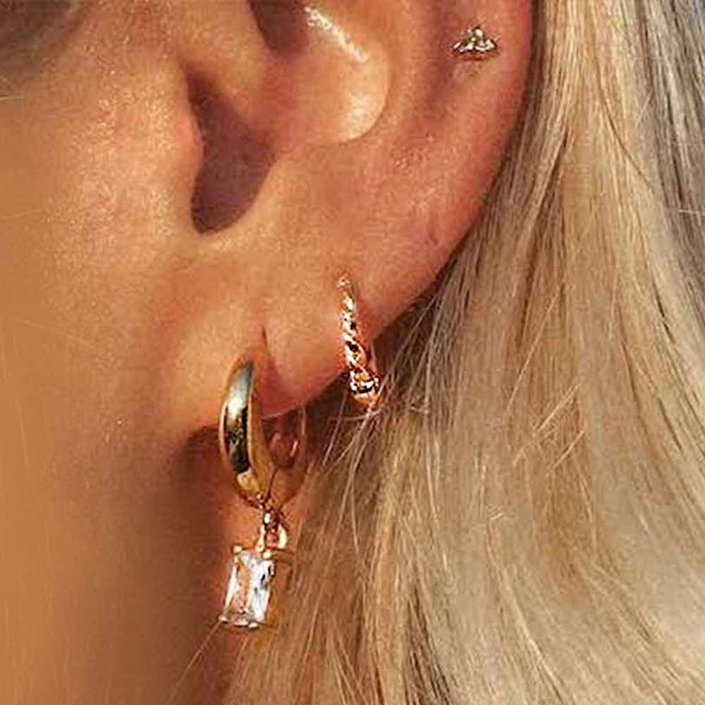 Twisted Huggie Hoop Earrings in Gold